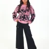 Pantalón cargo en negro con cinturón colección Rebel Dreamers
