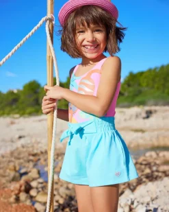 Pantalón corto azul para niña con cintura elástica y lazo