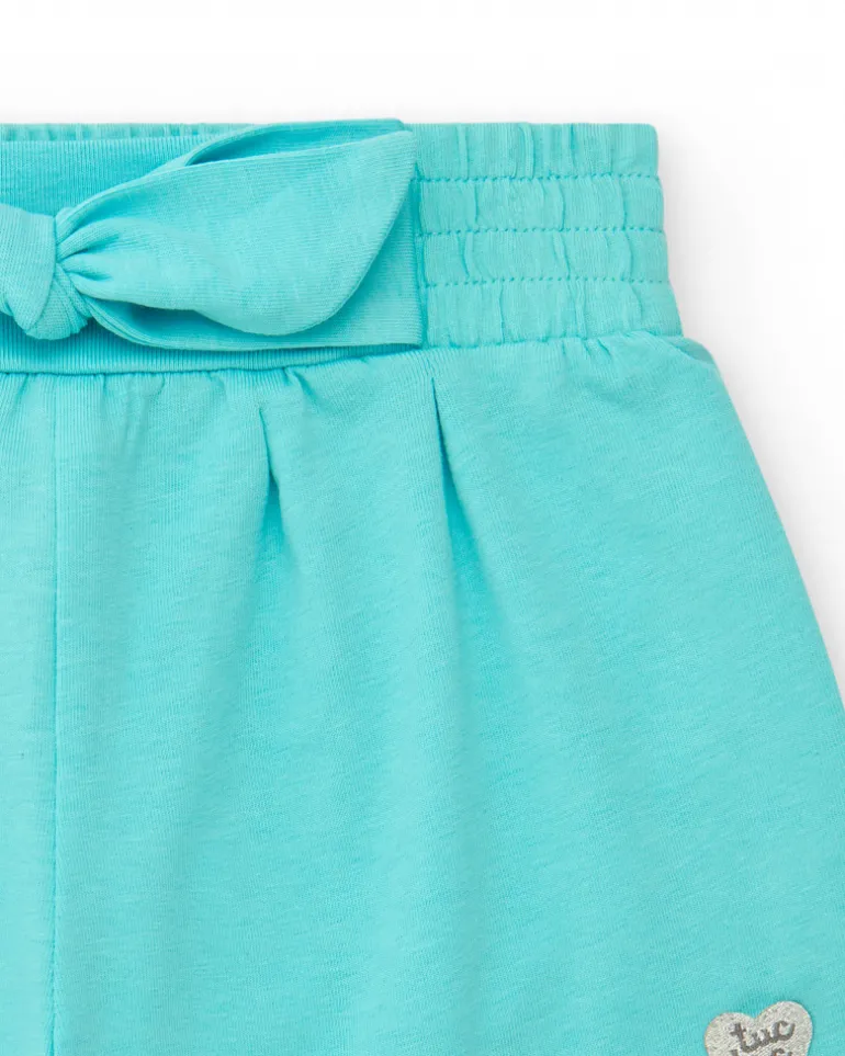Pantalón corto azul para niña con cintura elástica y lazo