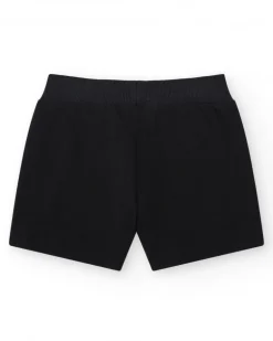 Pantalón corto para niña color negro con cintura elástica y bolsillos