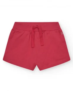 Pantalón corto para niña en rojo con cintura elástica y bolsillos