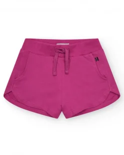 Pantalón corto para niña en fucsia con cintura elástica y bolsillos