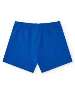 Pantalón corto para niña en azul con cintura elástica y lazo rojo