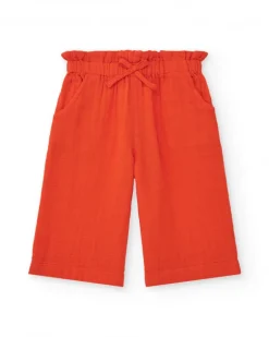 Pantalón culotte naranja para niña con cintura fruncida y lazo