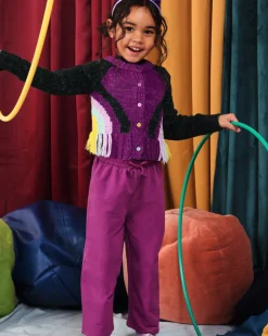 Pantalón para niña en color fucsia con lazo decorativo colección Cyber Dino