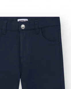 Pantalón para niño en negro con cintura elástica y bolsillos laterales