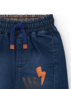 Pantalón vaquero jogger para niño en azul con estampado de rayo colección Super Natural