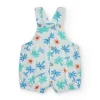 Pelele blanco para niño con estampado de palmeras y soles, tirantes ajustables y botones