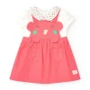 Peto rosa para niña con elefante en relieve y camiseta blanca de lunares