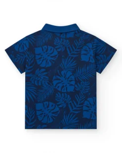 Polo para niño en azul con estampado tropical y bordado