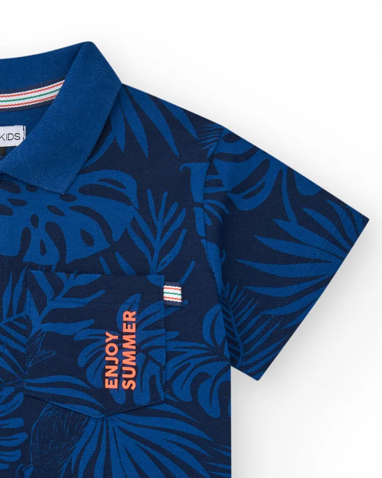 Polo para niño en azul con estampado tropical y bordado