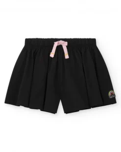 Short para niña en negro con lazo rosa y bordado de arcoíris