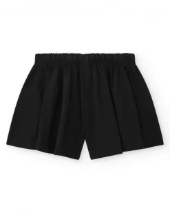 Short para niña en negro con lazo rosa y bordado de arcoíris