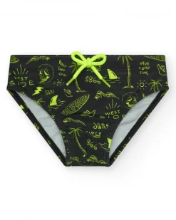 Slip de baño para niño en negro con estampado surfero y cordón flúor.