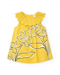 Vestido amarillo sin mangas para niña con estampado floral y cuello volante