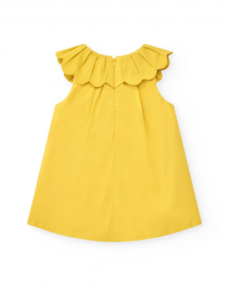 Vestido amarillo sin mangas para niña con estampado floral y cuello volante