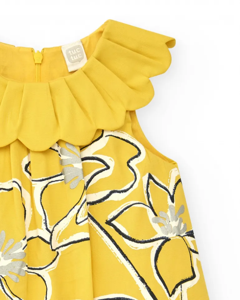 Vestido amarillo sin mangas para niña con estampado floral y cuello volante