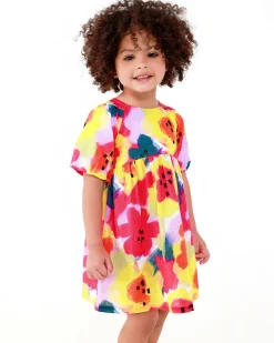 Vestido de plana para niña en lila con flores amarillas y rosas y mangas abullonadas