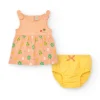 Vestido melocotón para niña con estampado floral y tirantes anudados