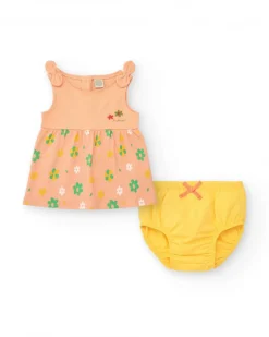 Vestido melocotón para niña con estampado floral y tirantes anudados