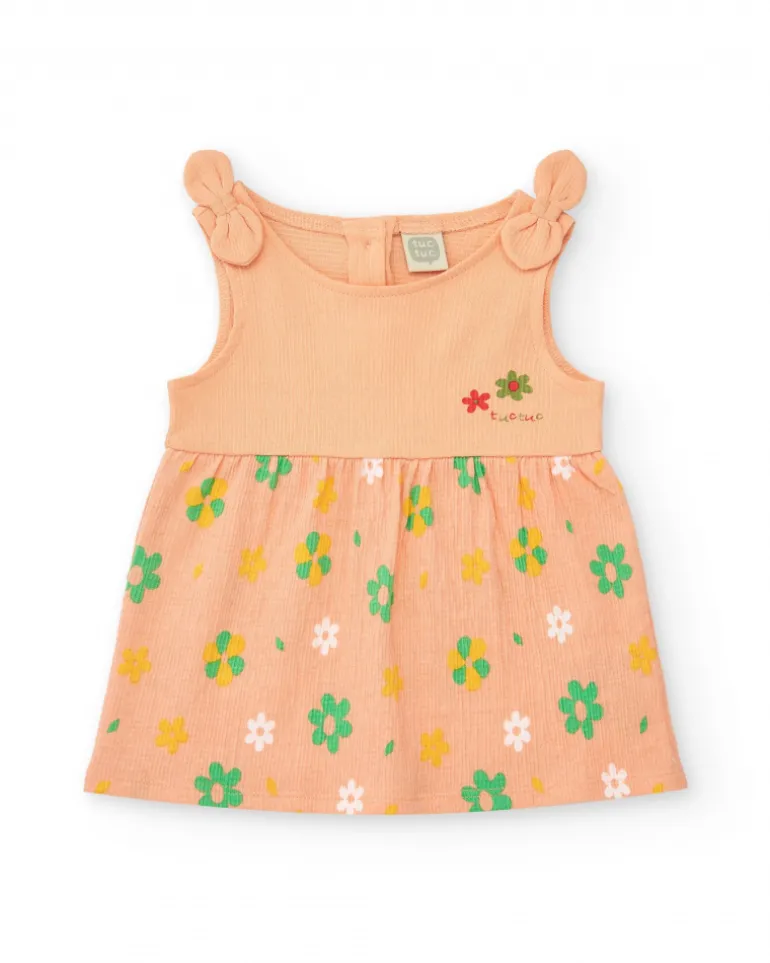 Vestido melocotón para niña con estampado floral y tirantes anudados
