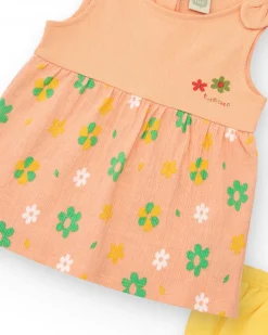 Vestido melocotón para niña con estampado floral y tirantes anudados