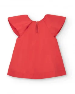 Vestido naranja para niña con volantes
