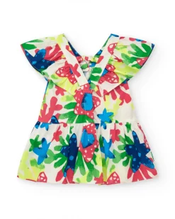 Vestido para niña en blanco con estampado floral y volantes