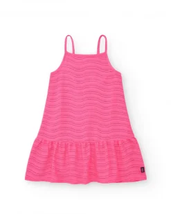 Vestido para niña en rosa con tirantes y volante